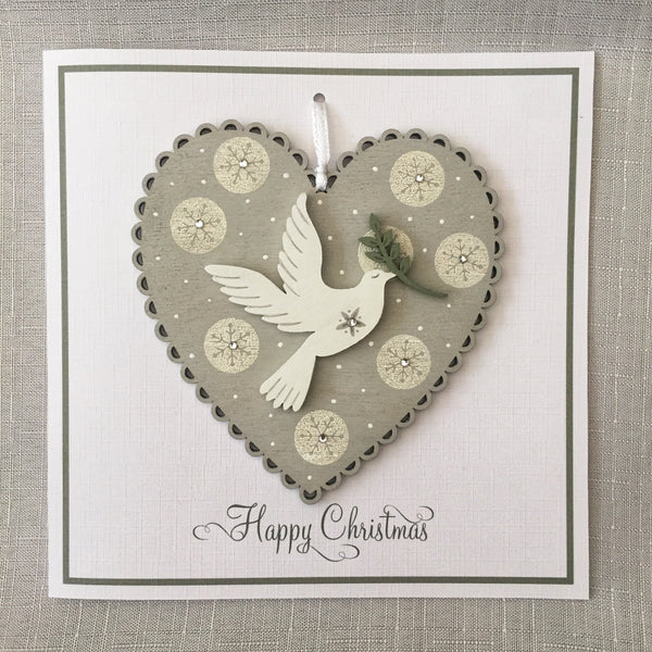 Painted Heart Decoration Christmas Card. Snowflake circle design.